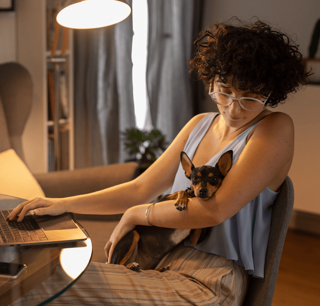 Blue Zebra employee working from home with her dog